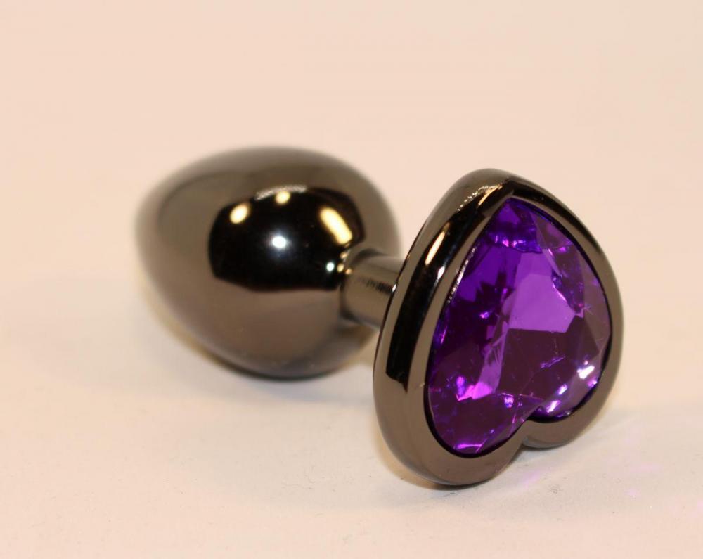 Анальная пробка черного цвета с ярким кристаллом фиолетового цвета в форме сердечка размер S